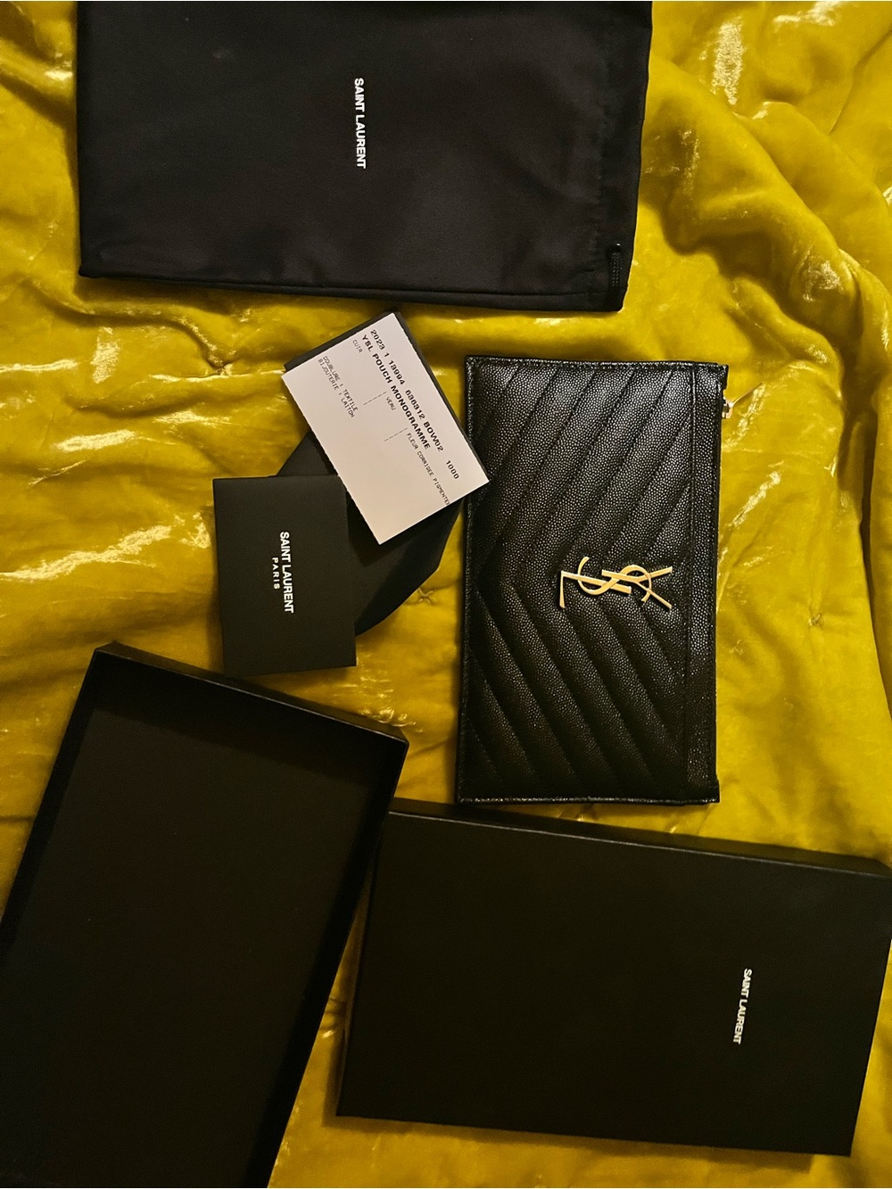 Ysl clutch with autheticated paper and box